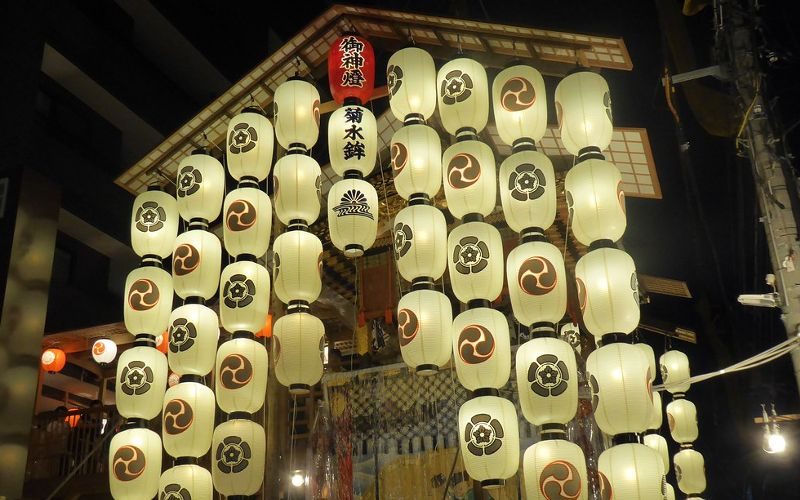 Paper lanterns light up during Yoiyama